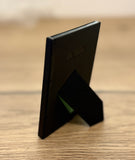 Signed Mini Framed Piece of the Original John B Loft Green Screen